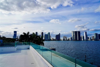 A commanding trophy estate on the open bay within the ultra