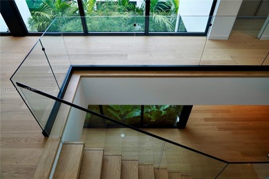 A commanding trophy estate on the open bay within the ultra