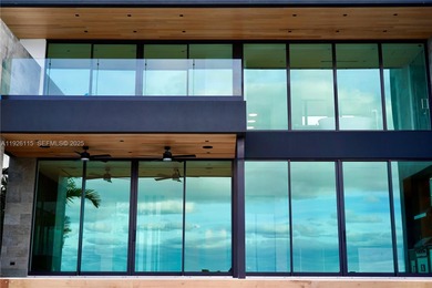 A commanding trophy estate on the open bay within the ultra