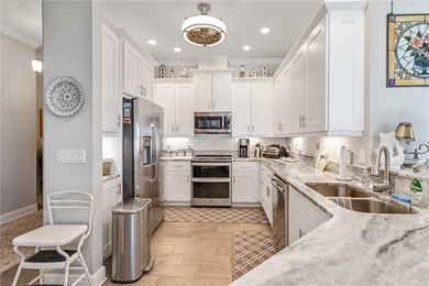 Welcome to Palma Sola Bay Club, a luxury gated condominium