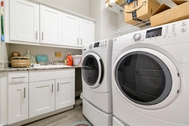 Welcome to Palma Sola Bay Club, a luxury gated condominium