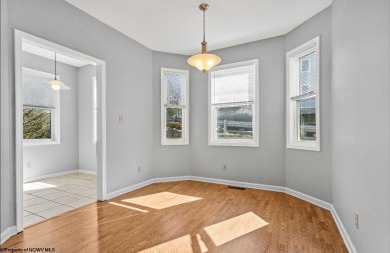 Check out this fantastic corner unit adjacent to the elevator!