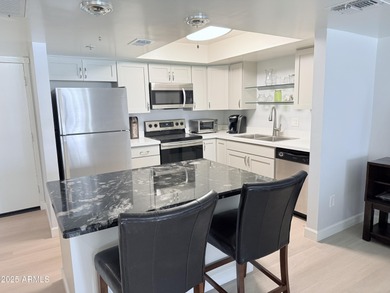 This beautifully updated first-floor condo offers over $50,000