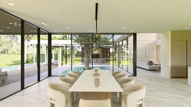 Located in the exclusive Spanish River Land community of East