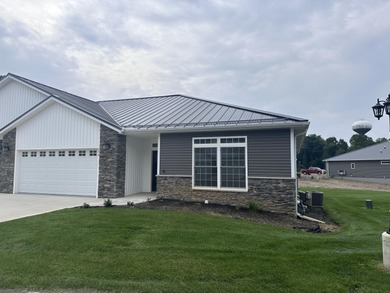 Welcome to this inviting 4 bed, 3 full bath condominium in the