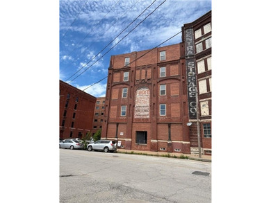 Historic West Bottoms brick build, 5 story, iron front building