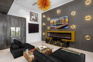 Indulge in luxurious coastal living at this elegantly-remodeled