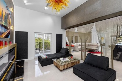 Indulge in luxurious coastal living at this elegantly-remodeled