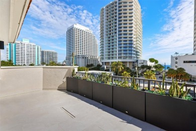 Indulge in luxurious coastal living at this elegantly-remodeled