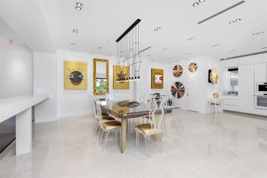 Indulge in luxurious coastal living at this elegantly-remodeled