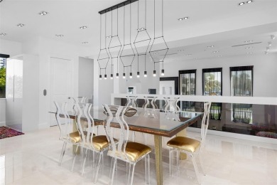 Indulge in luxurious coastal living at this elegantly-remodeled