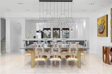 Indulge in luxurious coastal living at this elegantly-remodeled