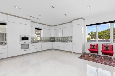 Indulge in luxurious coastal living at this elegantly-remodeled