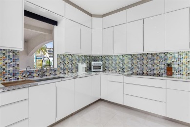 Indulge in luxurious coastal living at this elegantly-remodeled