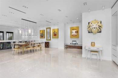 Indulge in luxurious coastal living at this elegantly-remodeled