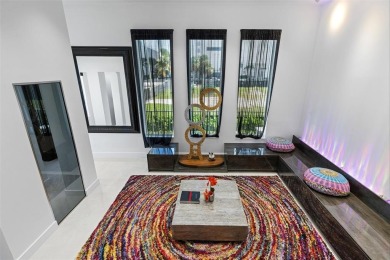 Indulge in luxurious coastal living at this elegantly-remodeled