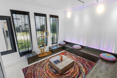 Indulge in luxurious coastal living at this elegantly-remodeled