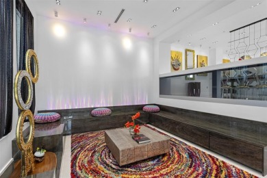 Indulge in luxurious coastal living at this elegantly-remodeled