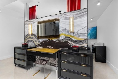 Indulge in luxurious coastal living at this elegantly-remodeled