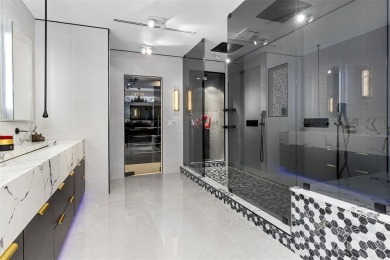 Indulge in luxurious coastal living at this elegantly-remodeled