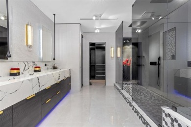 Indulge in luxurious coastal living at this elegantly-remodeled