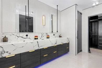 Indulge in luxurious coastal living at this elegantly-remodeled