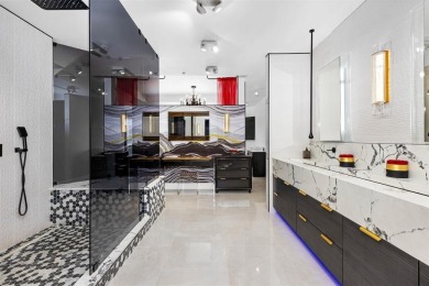 Indulge in luxurious coastal living at this elegantly-remodeled