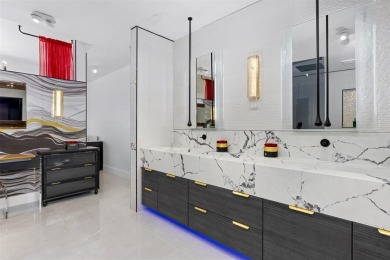 Indulge in luxurious coastal living at this elegantly-remodeled