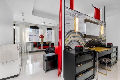 Indulge in luxurious coastal living at this elegantly-remodeled