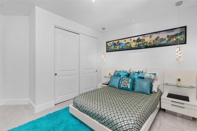 Indulge in luxurious coastal living at this elegantly-remodeled