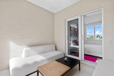 Indulge in luxurious coastal living at this elegantly-remodeled