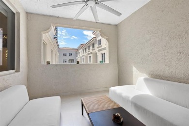 Indulge in luxurious coastal living at this elegantly-remodeled