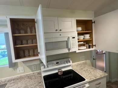 Welcome to this beautifully maintained 1980 home, offering 1,248