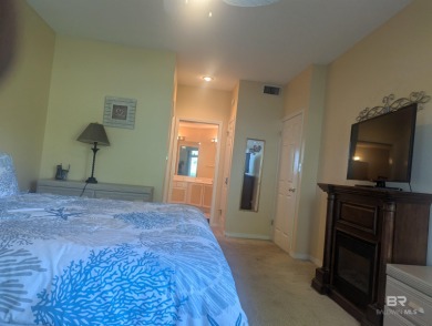 Motivated Seller! This spacious 2BR/2BA ground-floor condo