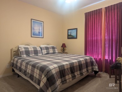 Motivated Seller! This spacious 2BR/2BA ground-floor condo