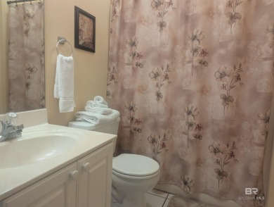 Motivated Seller! This spacious 2BR/2BA ground-floor condo