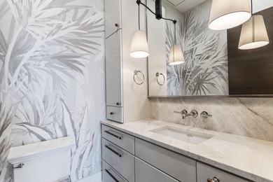 Experience the pinnacle of luxury coastal living in this