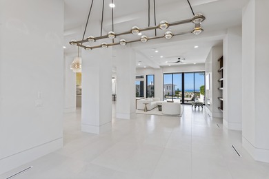 Experience the pinnacle of luxury coastal living in this