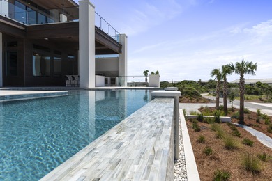Experience the pinnacle of luxury coastal living in this