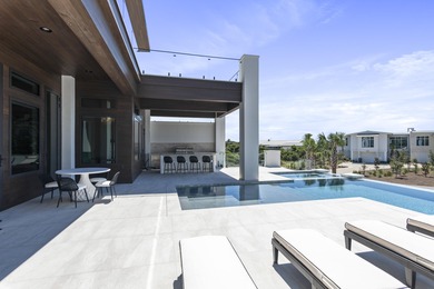 Experience the pinnacle of luxury coastal living in this