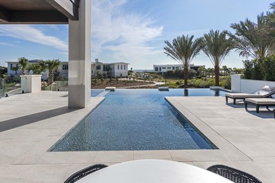 Experience the pinnacle of luxury coastal living in this