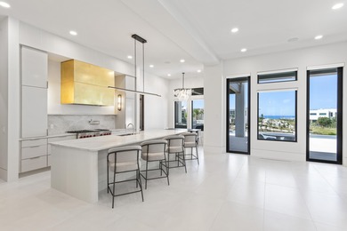Experience the pinnacle of luxury coastal living in this