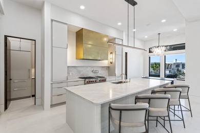 Experience the pinnacle of luxury coastal living in this