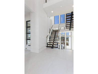 Experience the pinnacle of luxury coastal living in this