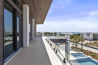 Experience the pinnacle of luxury coastal living in this