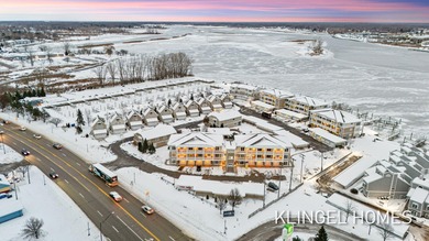 Welcome to the Marina Bay Condominiums of Spring Lake! From the