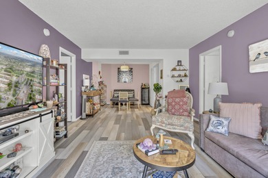 Stunning 2BD/2BA residence with panoramic views in a secure