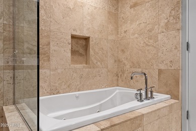 Rare unit with two expansive patios showcasing spectacular