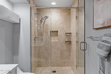 Rare unit with two expansive patios showcasing spectacular