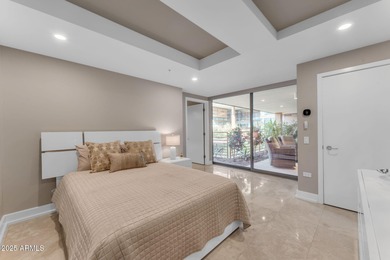 Rare unit with two expansive patios showcasing spectacular